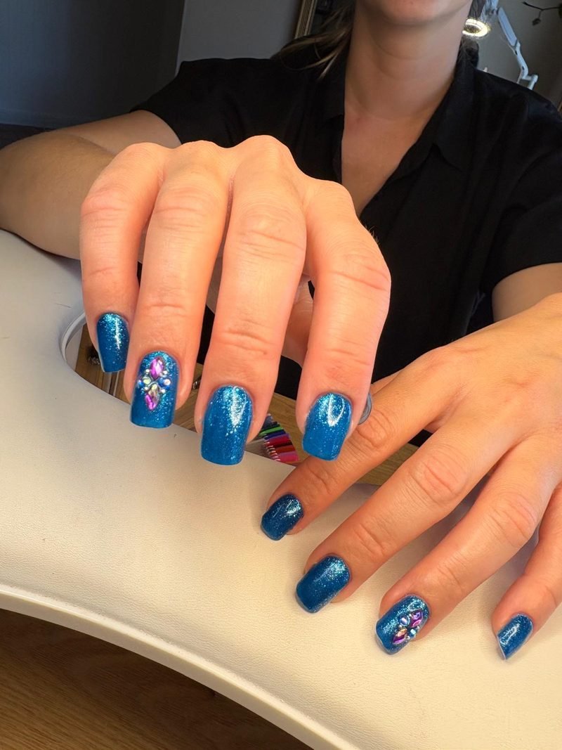Blue BIAB nails with crystal accent at Queen Bee Nails Rockingham WA