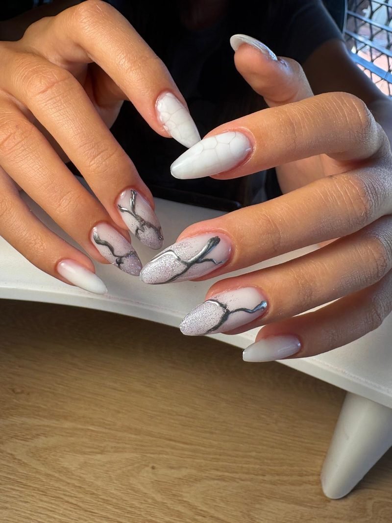 White marble stiletto hard gel nails at Queen Bee Nails Rockingham WA